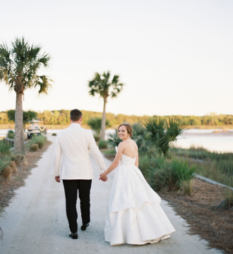 Elopements & Micro Weddings 5 back of couple, bride looking over shoulder.