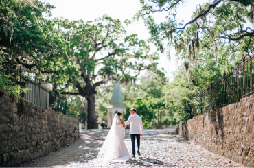back of couple in alleyway