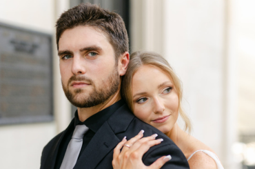 bride laying head on back of groom.